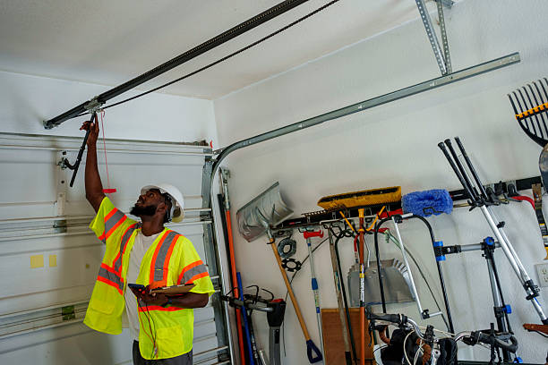 Professional Garage Door Panel Replacement technician working in Lenox, IA